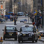 Taxis on the Royal Mile - Edinburgh, Scotland